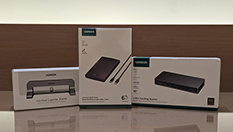 Découvrez 3 accessoires high-tech qui ont amélioré le confort de mon espace de travail : une station d'accueil, un support d'ordinateur vertical et un boîtier disque dur externe